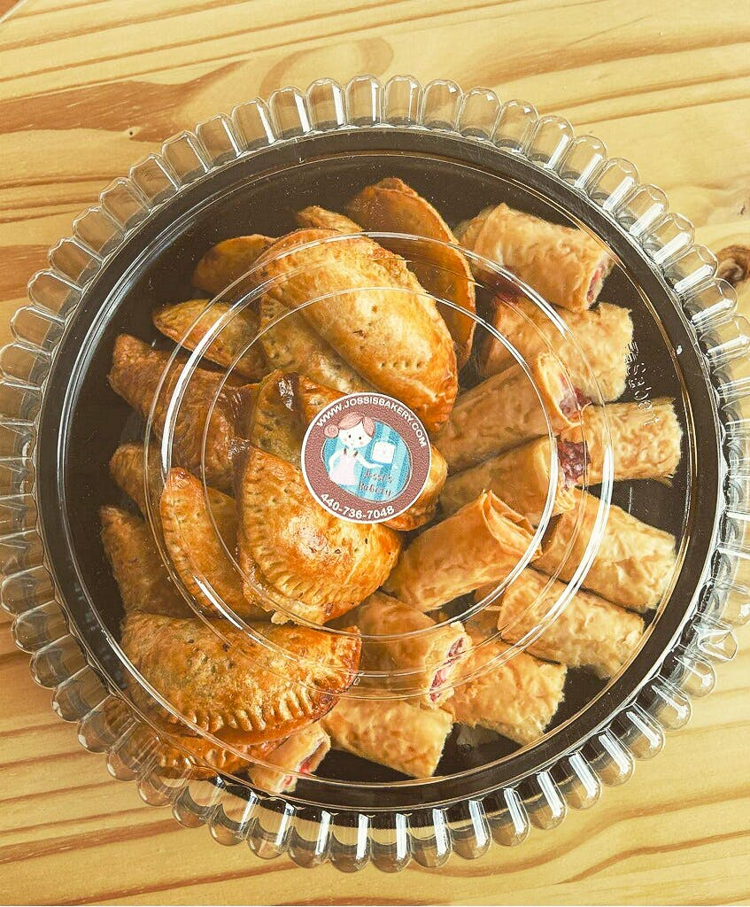 A tray of an assortment of traditional latin pastries.
